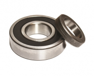 Conversion bearing for small bearing Ford 9" axle in large bearing housing. 